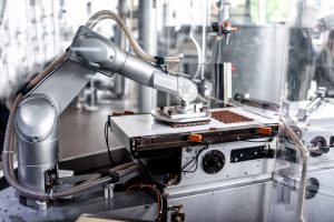 Robotarm i produktion